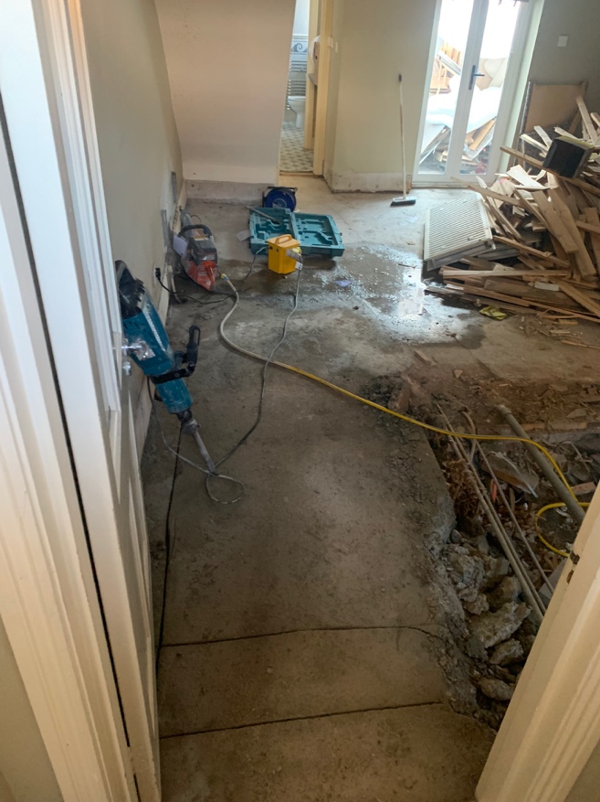 Concrete floor broken up for drainage alteration