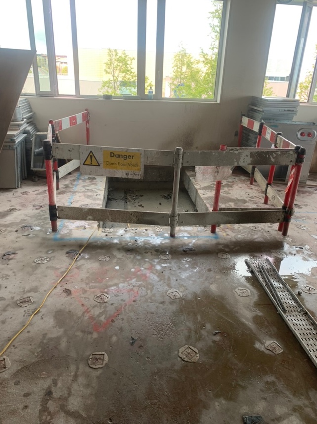 Floor sawing with safety barriers